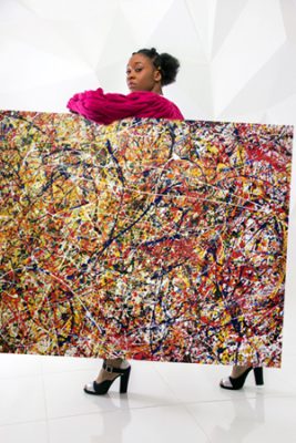 African fashion model with a jackson pollock painting
