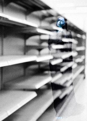 ghost walking through empty store aisle